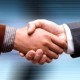 A handshake closes the sale